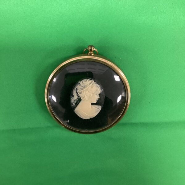 Vintage miniature cameo pendant by Peter Bates Limited featuring a ponytailed girl.
