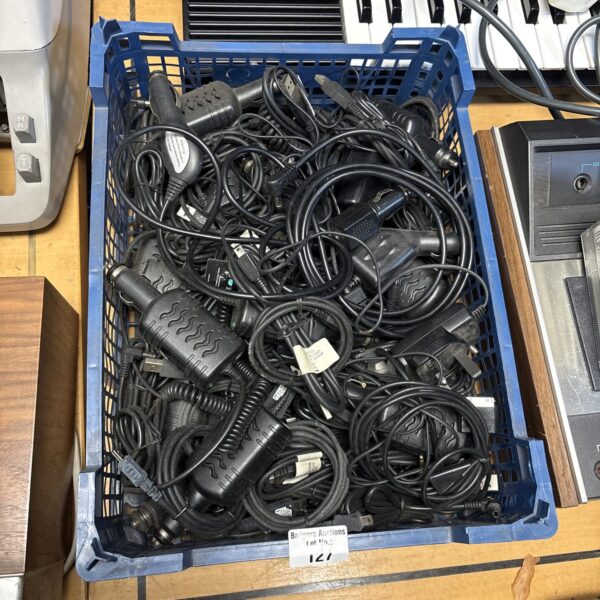 Mixed cable lot with assorted power and charger cables.