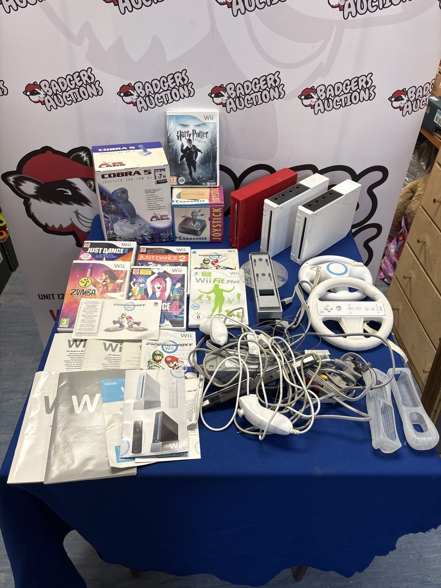 143 Three Nintendo Wii’s Inc Special Edition With Games, Manuals, Accessories And Cables