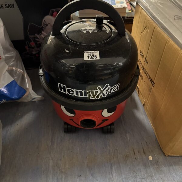 Red Numatic Henry Xtra vacuum cleaner body for parts or repair.