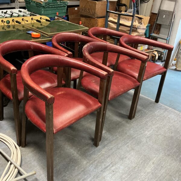 Lot of six vintage Polish leather pub chairs with red upholstery.