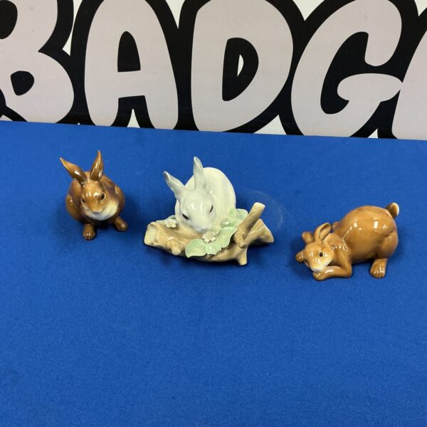 Lot of three delicate porcelain rabbit figurines for collectors.