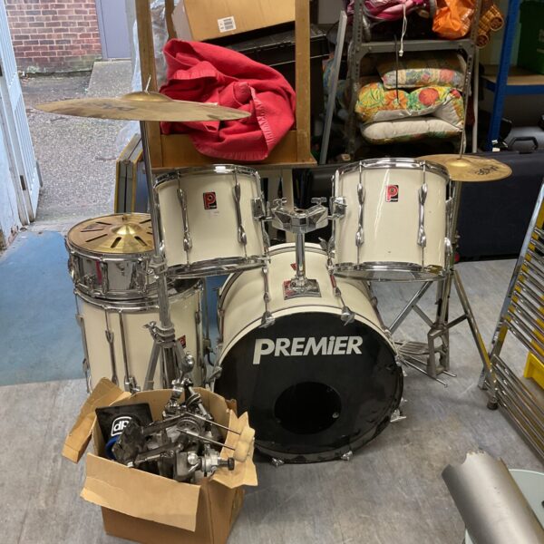 White Premier drum kit with cymbals and pedals included.