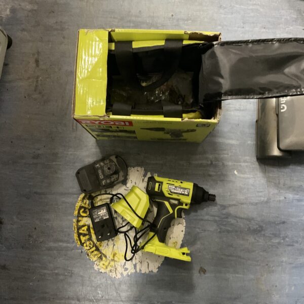 Ryobi One+ cordless impact driver kit with battery and charger.