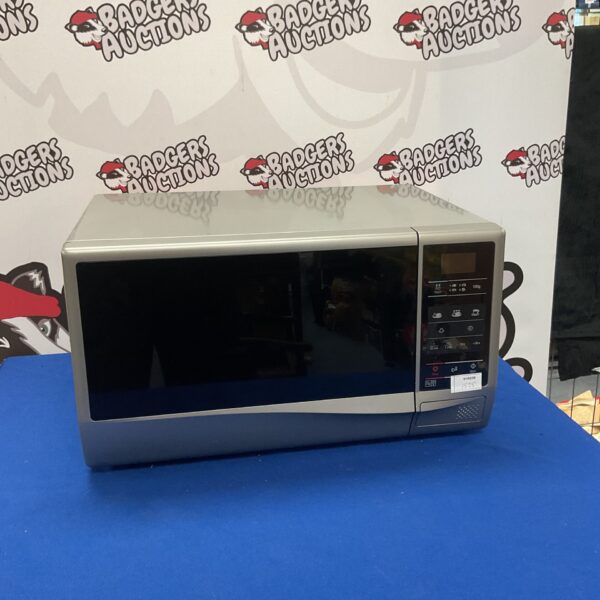 White Samsung 800W microwave oven on a countertop.
