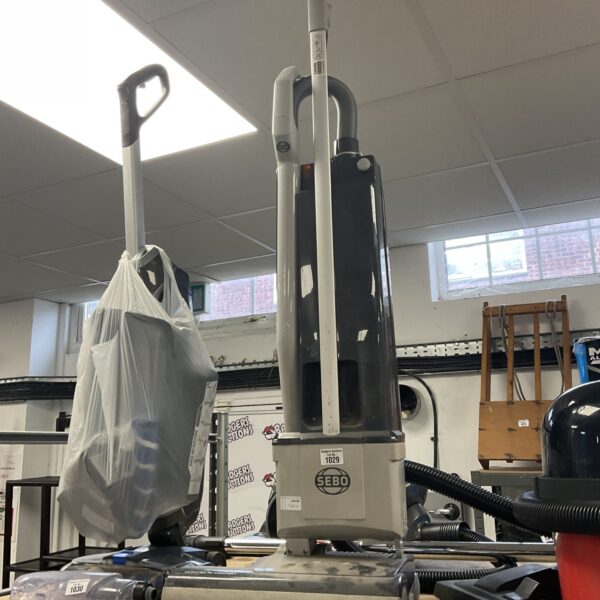 Sebo BS36 vacuum cleaner in a workshop setting.