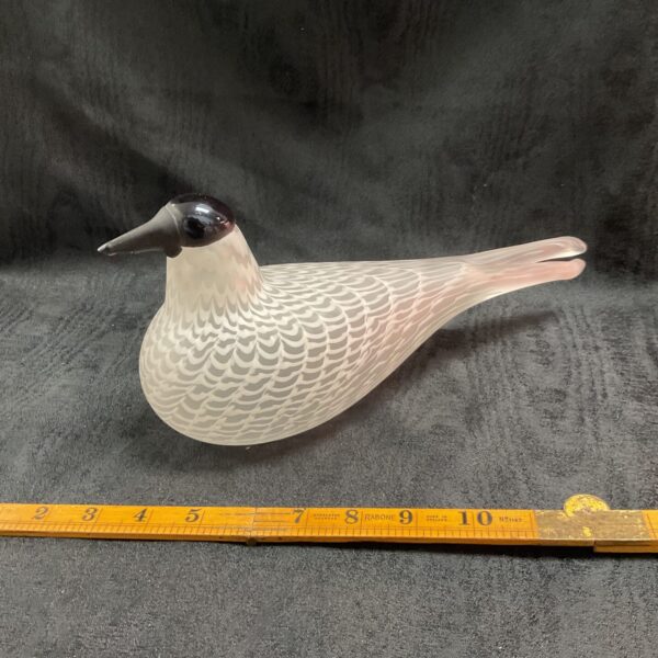 Vintage signed glass seagull sculpture with textured detail.