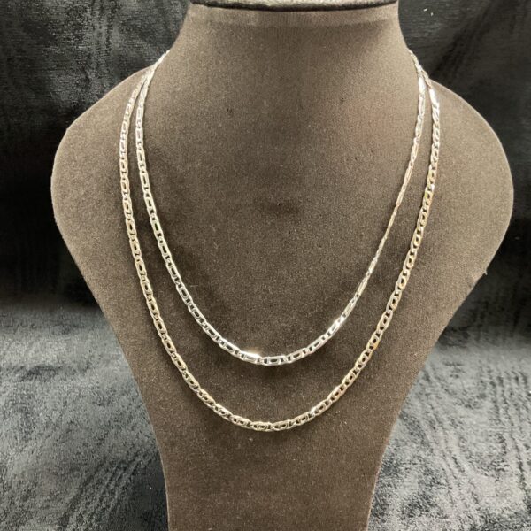 Two 925 silver anchor link chains displayed on a mannequin.