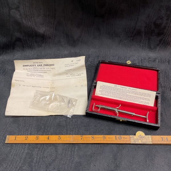 Vintage Simplicity ear piercer in original packaging, 1970s.