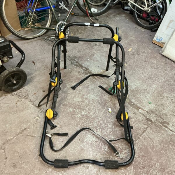 Metal frame of a three-bike carrier for vehicle mounting.