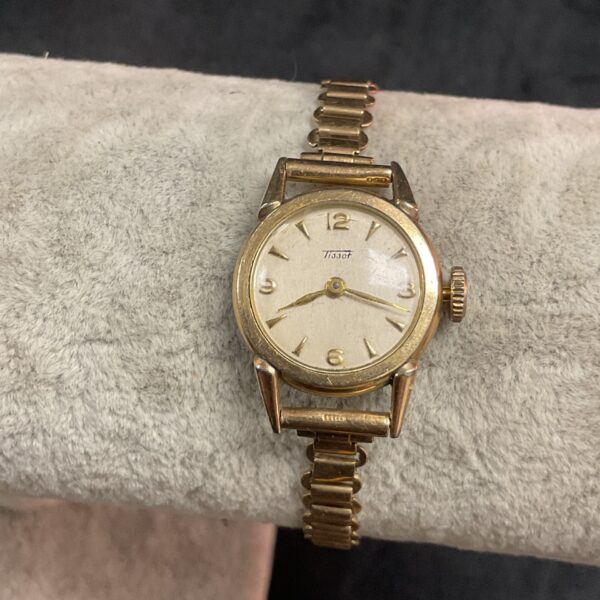Vintage 9ct gold Tissot ladies watch with gold bracelet.