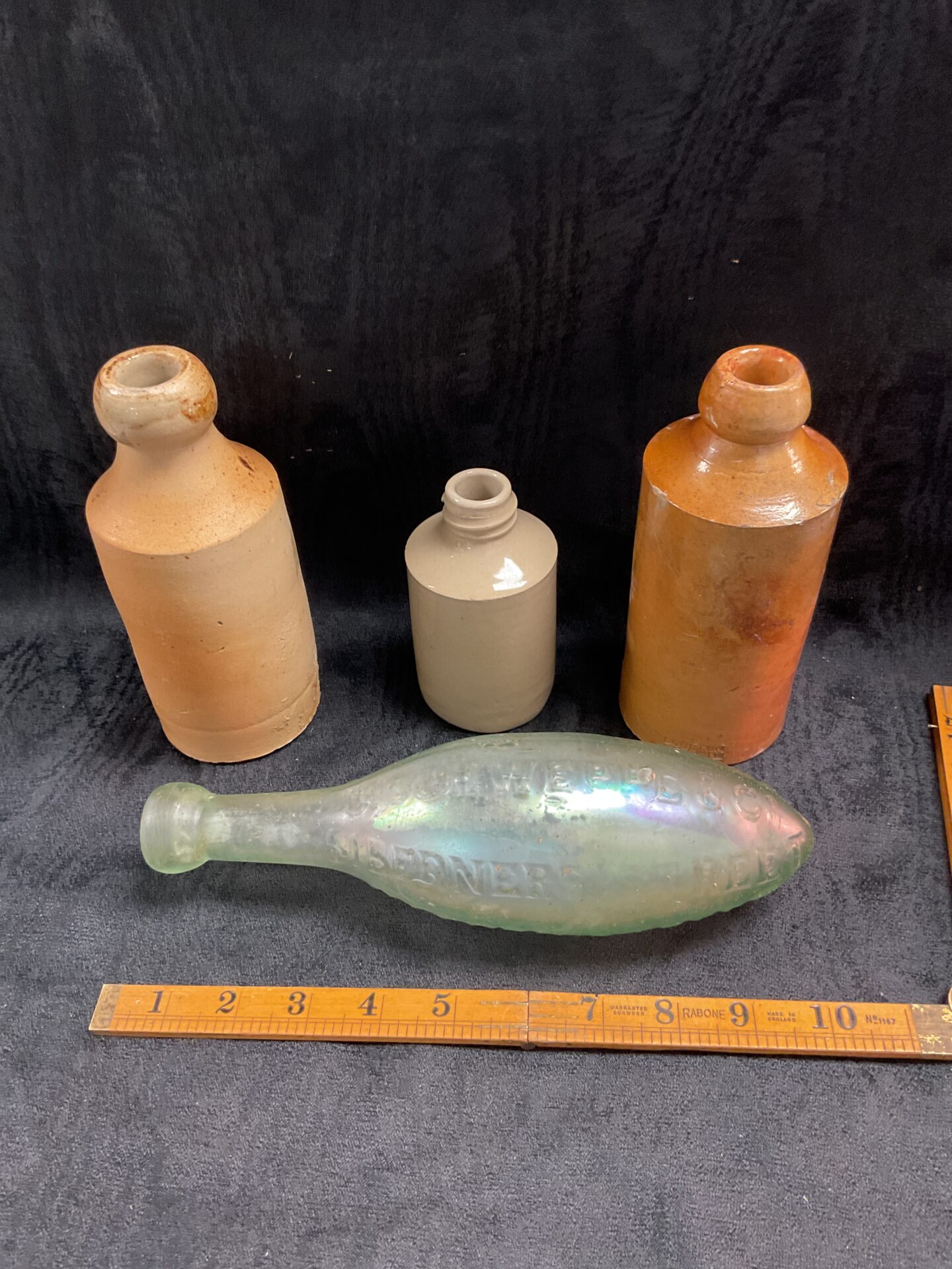 898 Three Victorian stoneware salt glazed bottles inc doulton lambeth and a Schweppes torpedo shaped glass lemonade bottle