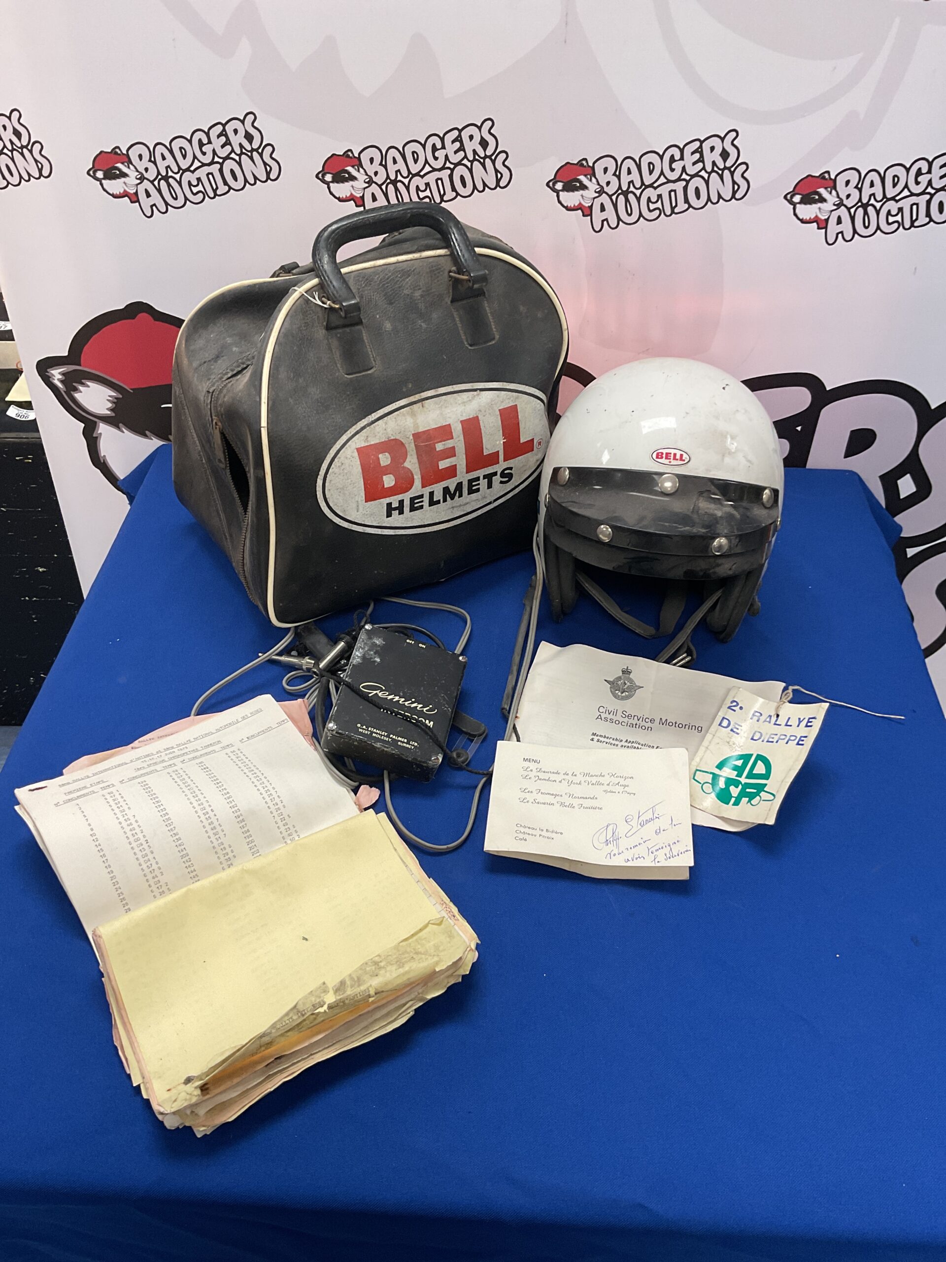 871 Vintage 1970s Bell rally race helmet with Gemini intercom and some rally related paperwork And Bell helmets bag