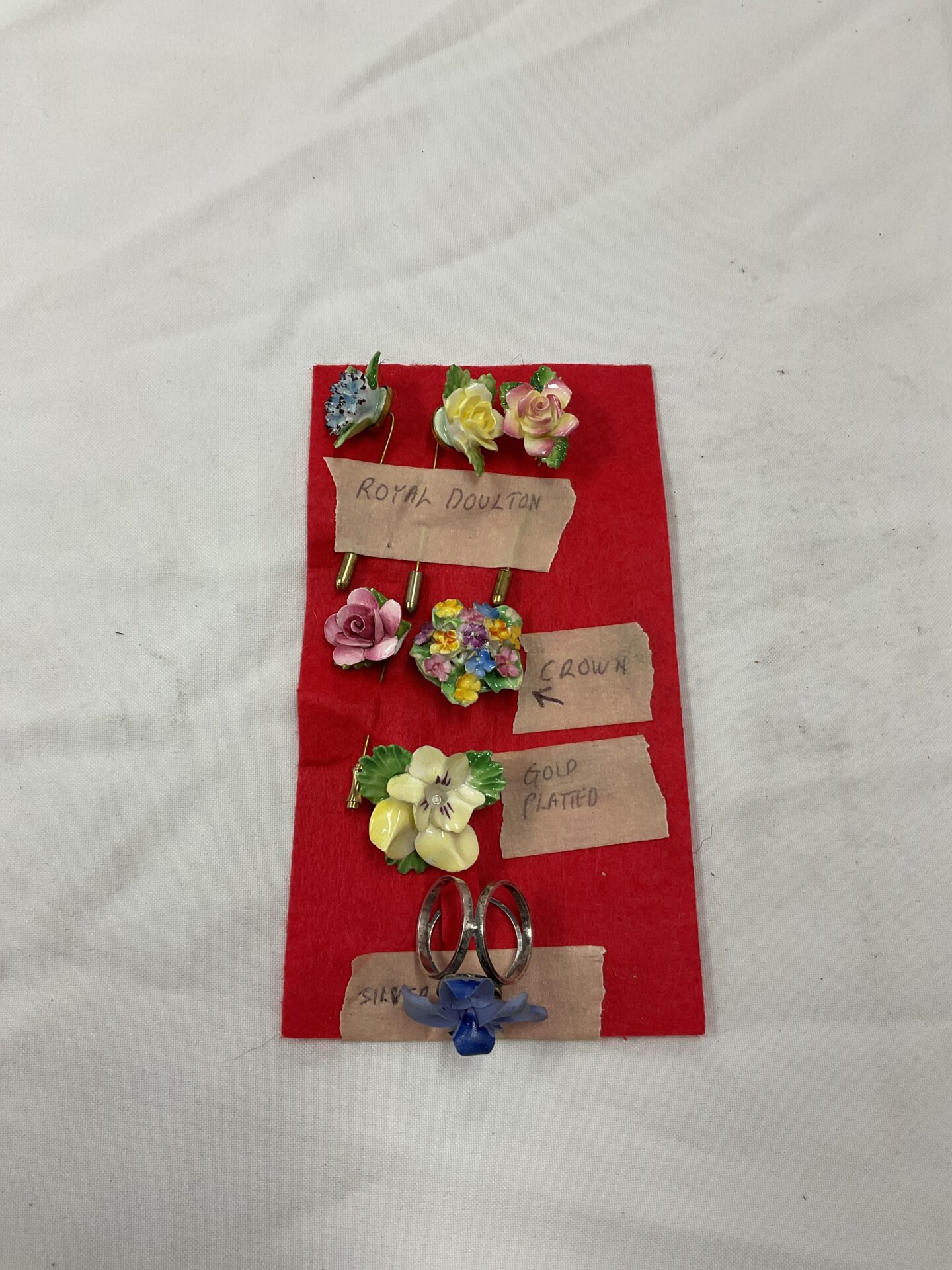 758 Selection of brooches including royal doulton & silver backed flower brooch