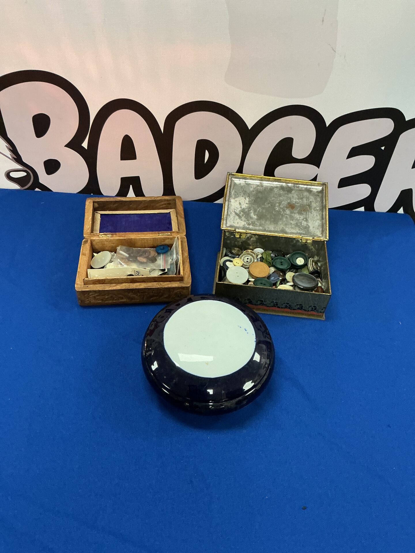 324 Two boxes of buttons and a bowl