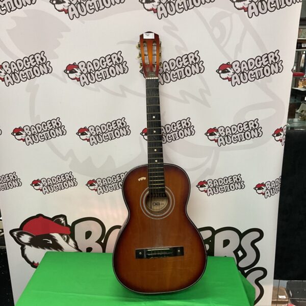 Vintage child rambler Japanese acoustic guitar in sunburst finish.