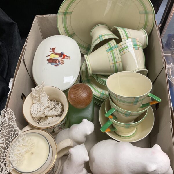 Vintage china tea set with ceramic polar bears on display.
