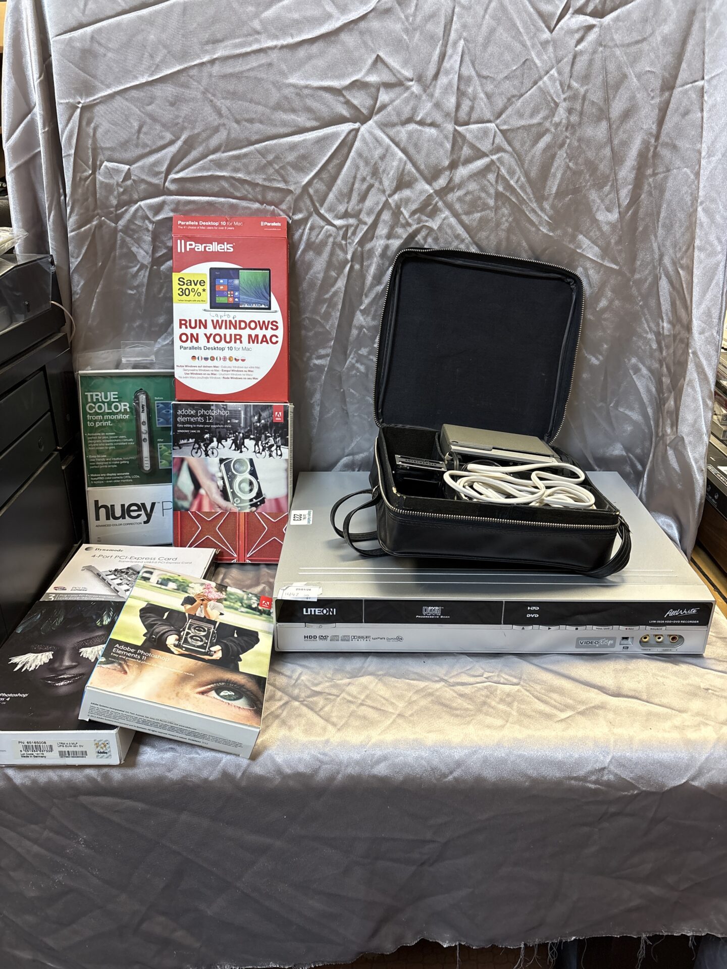 240 Liteon dvd recorder with vintage minolta camera and computing items