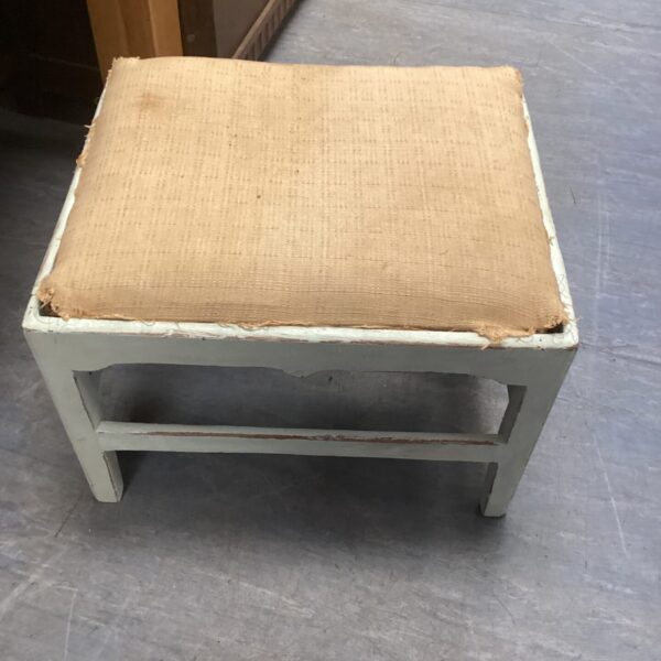 Vintage hand-painted stall with faded paint, ready for restoration.
