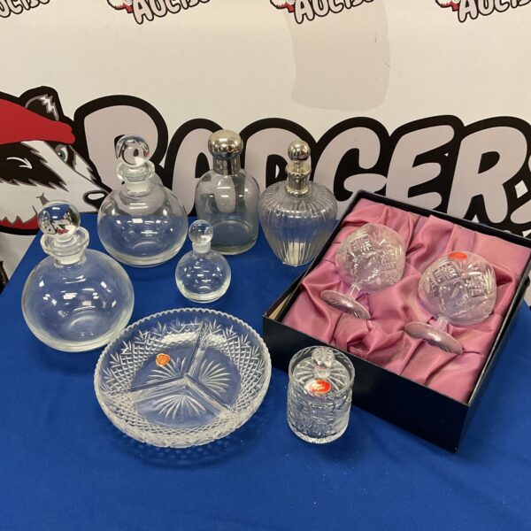 Vintage perfume bottles and Windsor cut crystal glassware collection.
