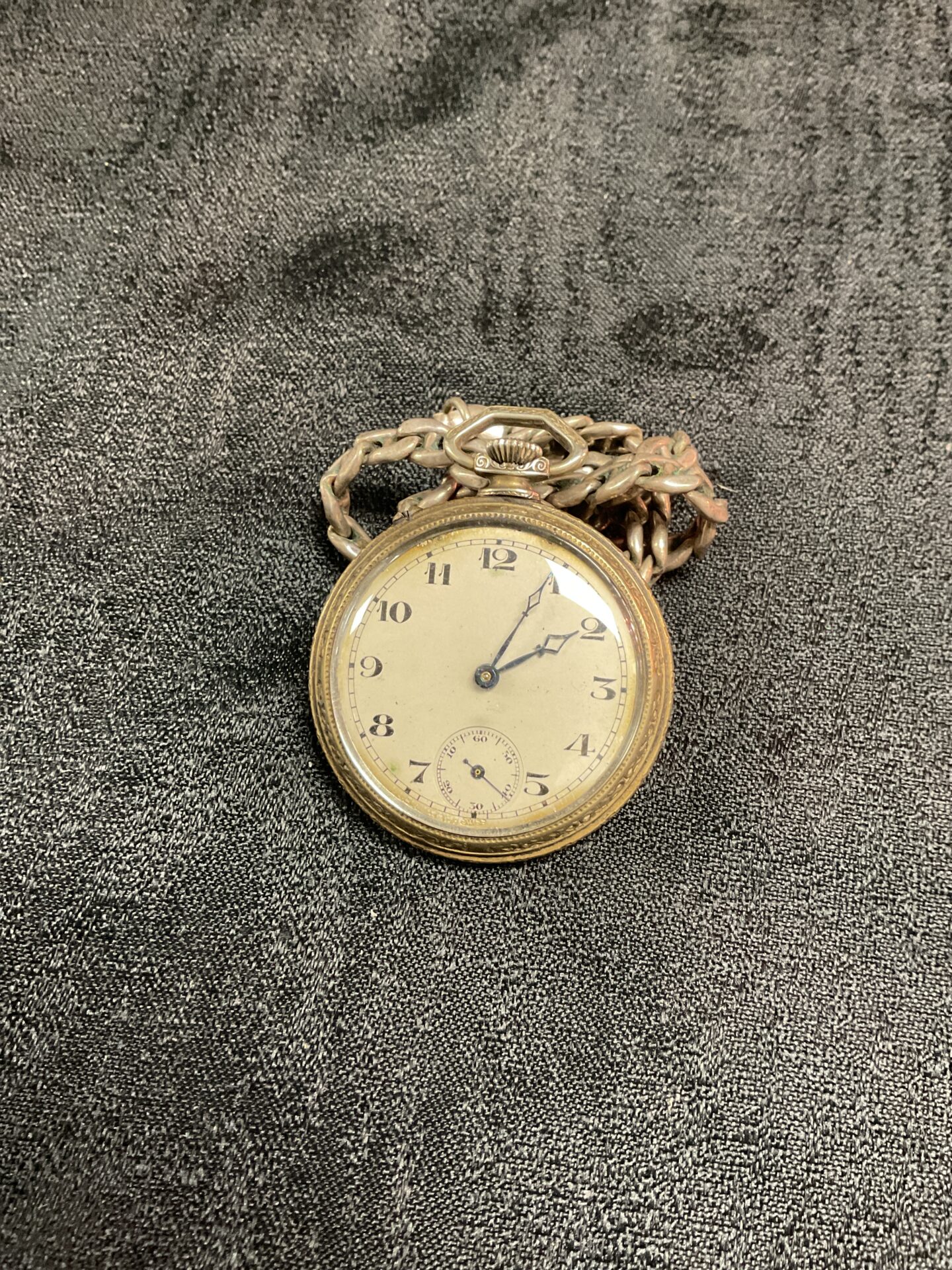801 Vintage nickel silver case pocket watch with reverse scale second dial
