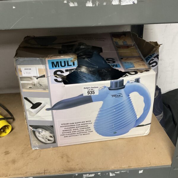 Vintage multi-purpose steam cleaner in original packaging.
