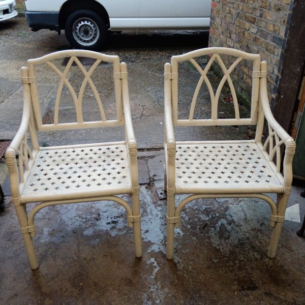 Pair of white painted bentwood chairs with vintage appeal.