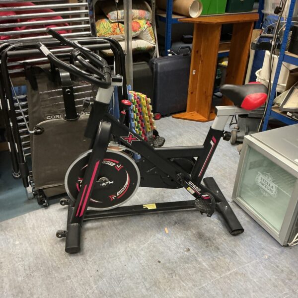 X Sports fitness bike for indoor cardio exercise at home.