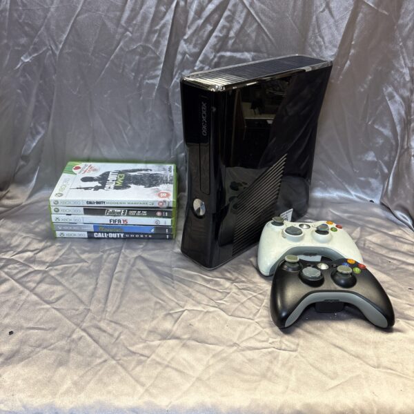 Microsoft Xbox 360 console with games and controller setup.