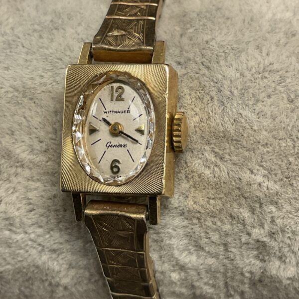 Vintage 14k gold Wittnauer ladies watch with textured band.