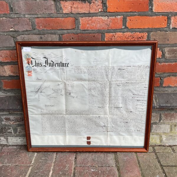 Framed 1901 indenture manuscript with GWR railway map detail.
