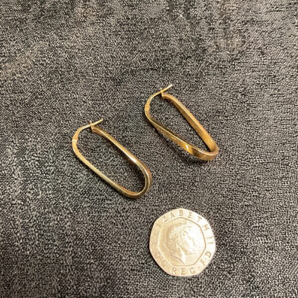 Pair of 9ct yellow gold hoop earrings for pierced ears.