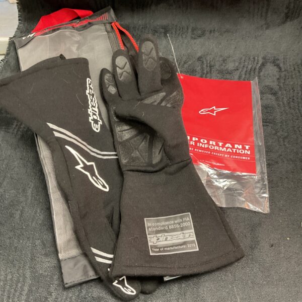 Alpinestars racing gloves from the Grand Tour collection, showing detail.