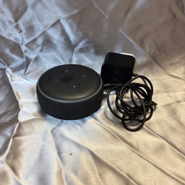 Black Amazon Echo Dot 3rd Generation smart speaker with charger.