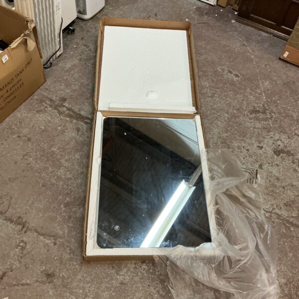 Open box showing an Emir LED bathroom mirror inside.