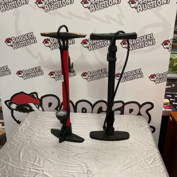 Two floor standing bicycle tyre pumps for cycle maintenance.