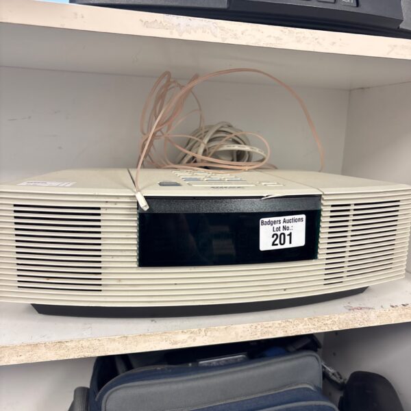 Vintage Bose Wave CD radio tabletop audio system.
