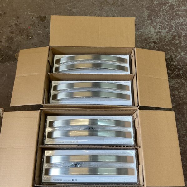 Two boxes of brushed steel bow handles for cabinets and furniture.