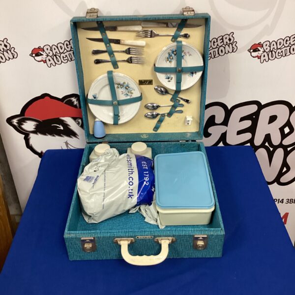 Blue Brexton vintage picnic set with contents open.