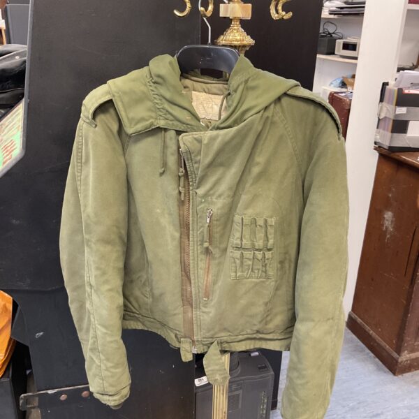 Olive green British Army combat jacket, front view.