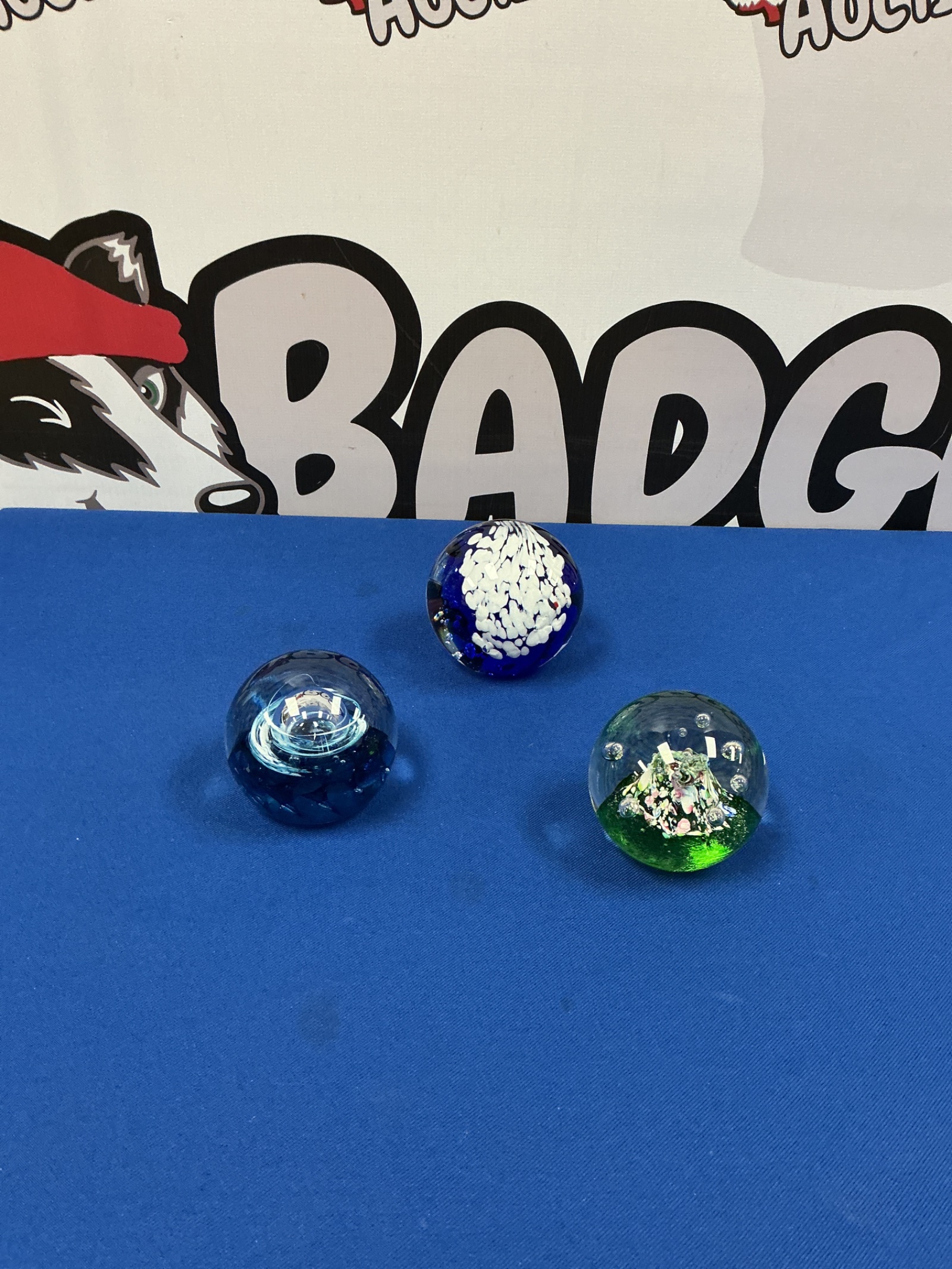 234 Three glass paperweights inc Caithness