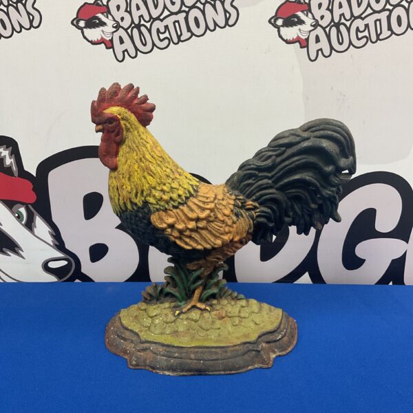 Vintage cast iron cockerel doorstop for farmhouse decor.