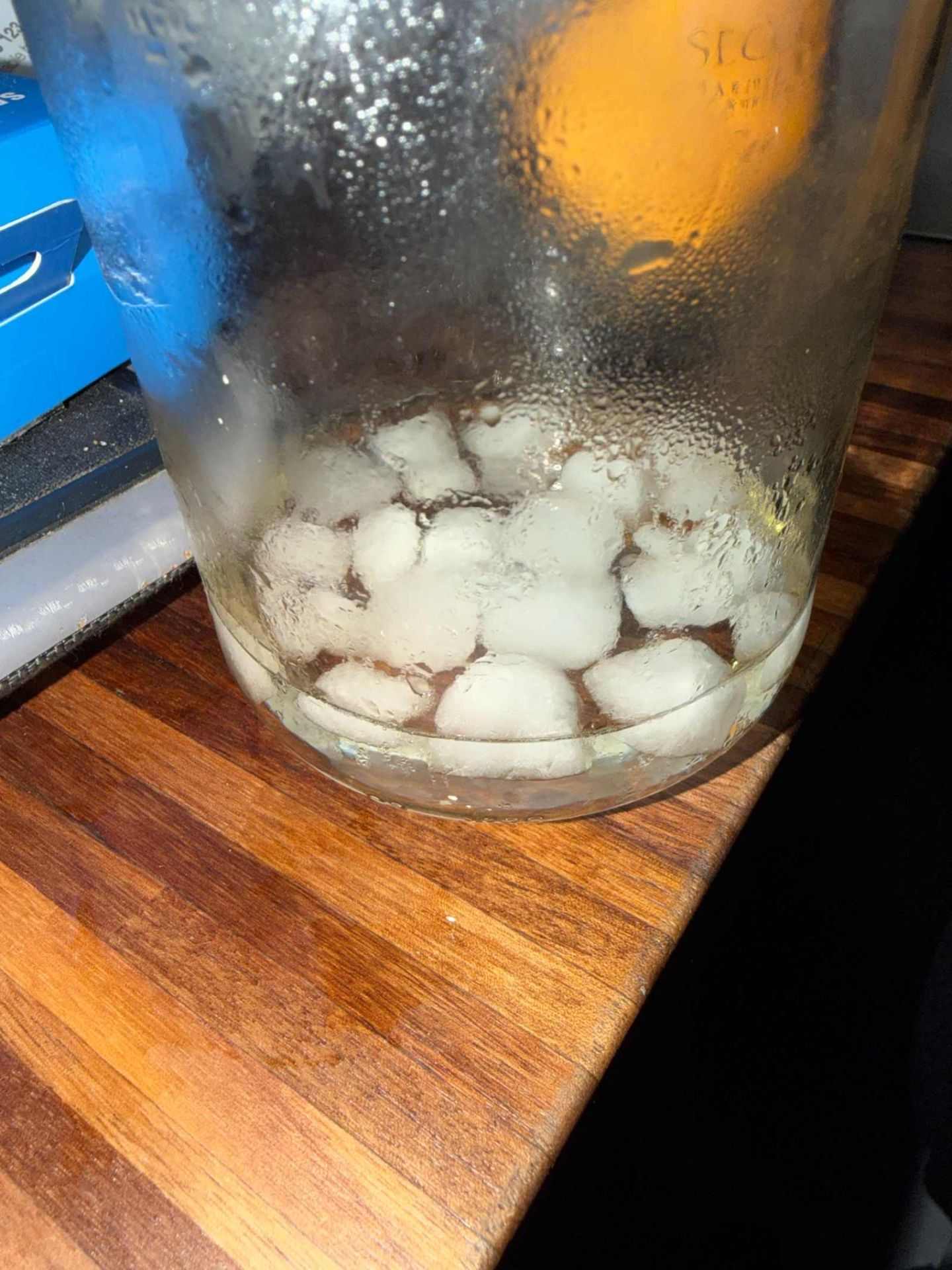 Unique ceramic bookcase sculpture for desk or shelf display.