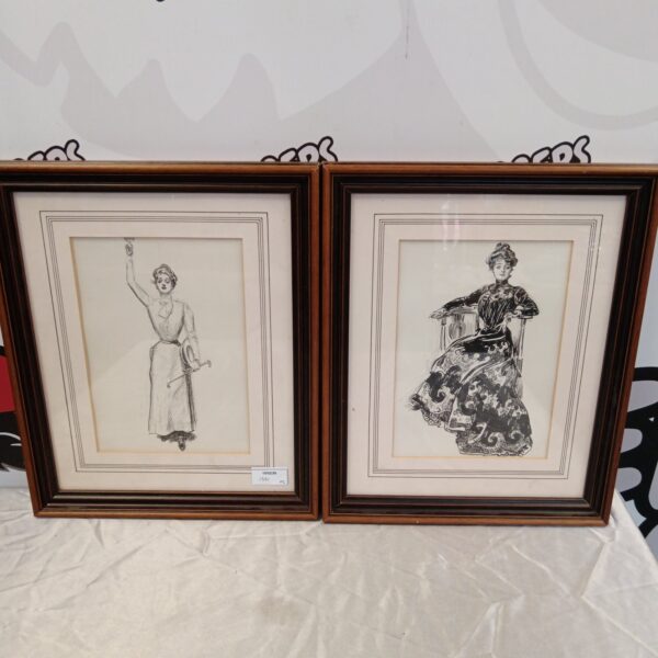 Pair of framed Charles Dana Gibson prints featuring classic Gibson Girls.