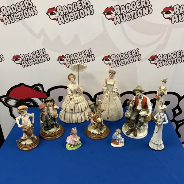 Collection of classical figurines in bisque porcelain and resin.