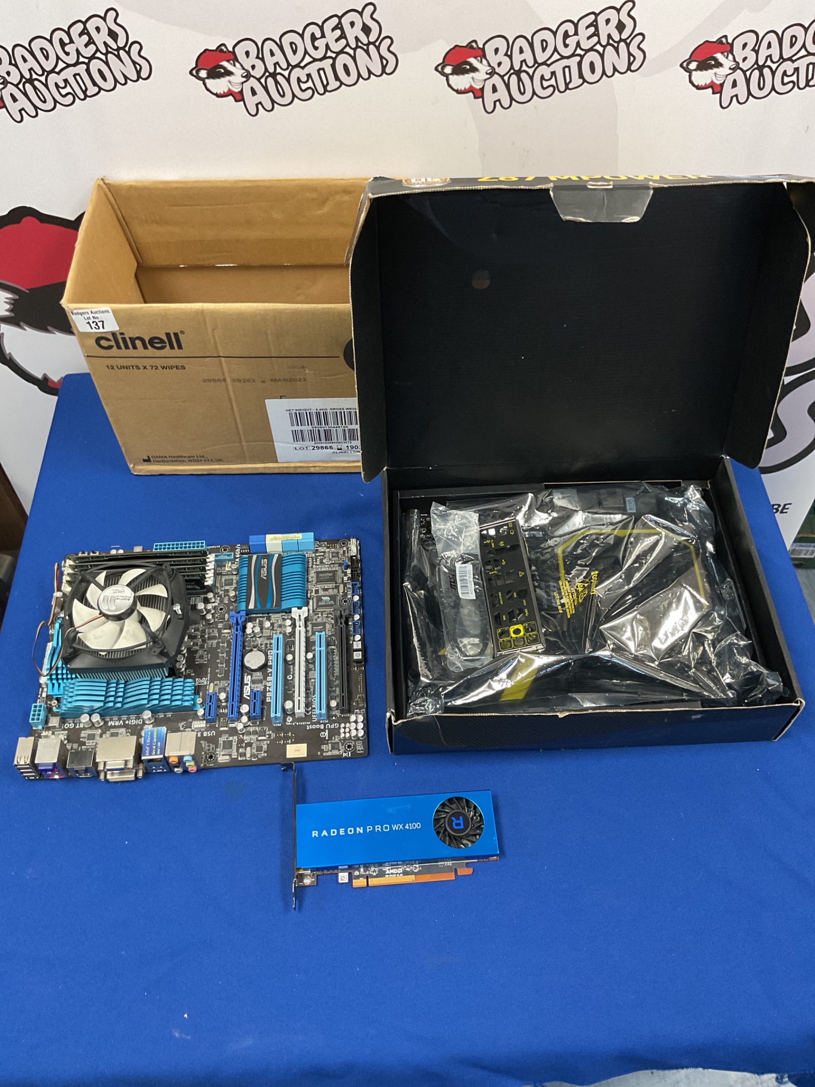 135 Box of computer motherboards and graphics card