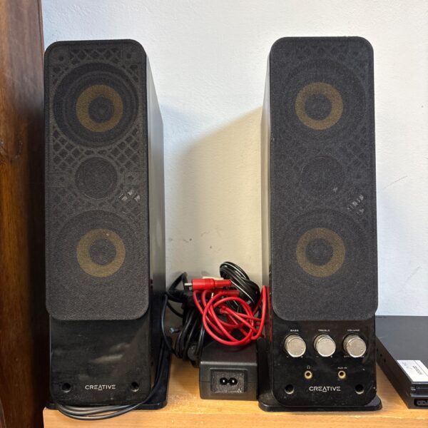 Pair of vintage Creative GigaWorks T4 desktop speakers.