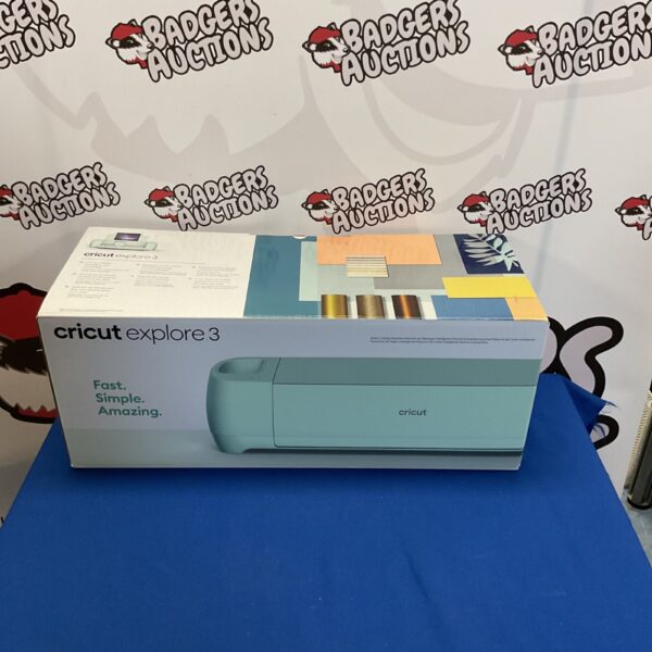 Cricut Explore 3 machine in original packaging, crafting tool.