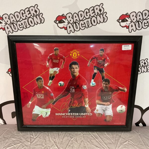 Framed Cristiano Ronaldo Manchester United football print for fans.