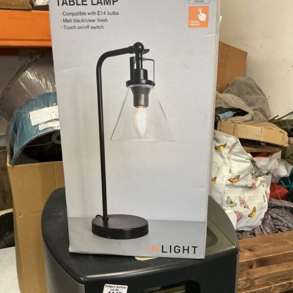 Vintage Daffy table lamp with fabric shade and metal base.